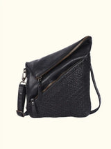 Black handbag on a white background