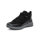 Black sneaker with gray sole on a white background