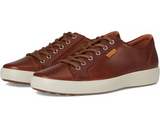 Brown leather sneakers on a white background