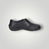 Black leather slip-on shoe on a white background