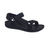 Black Strive Drift sandal with angled straps and open toe design, showcasing casual footwear style and comfort.
