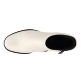 A single white leather ankle boot shown from a top-down view, featuring a black side zipper and a black outsole edge, set against a plain white background.