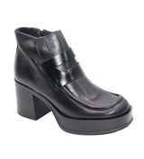 Black Eric Michael Gotham Boot with sleek leather design and sturdy sole, perfect for stylish and comfortable wear.