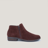 Naot Helm 26030 leather ankle boot with rounded toe, low heel, and ankle strap, shown in natural leather color.
