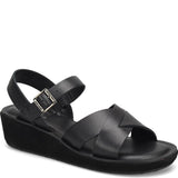 Kork Ease Myrna sandal with tan leather straps and wooden block heel, stylish open-toe design for casual summer wear.