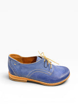 Blue leather shoe with laces on a white background