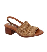 Eric Michael Rafa tan sandal with open toe design and ankle strap, displayed on a white background.