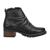 Black leather ankle boot with a brown sole on a white background