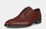 Brown leather dress shoe on a light gray background