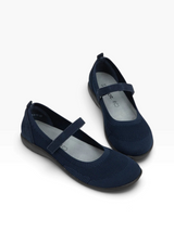 A pair of navy blue knit Mary Jane flats with hook-and-loop straps, displayed on a clean white background.