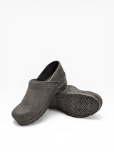 Black Sanita Original 450206W pebbled oiled women's clog featuring a sturdy design and slip-resistant sole.
