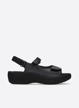 Wolky Jewel 3204 adjustable platform sandal with black straps and cushioned sole, styled for casual wear.