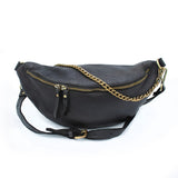 Black Bolsa Nova Capri leather sling handbag with sleek design and adjustable strap, ideal for everyday use.