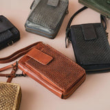 Milo Ella II 500 convertible handbag with crossbody strap, soft leather, and minimalist design, featuring a sleek plum color.