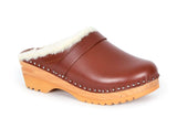 Brown clog shoe with white fur lining on a white background