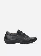 Black leather dress shoe on a white background