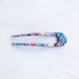 Tiepology Eco The French Hair Pin showing a sleek, eco-friendly hair accessory with a curved design on a white background.