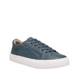 Blue sneaker with white sole on a white background