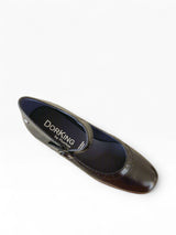 Black shoe with a black interior on a light grey background