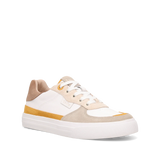 Sneaker with white, beige, and yellow color scheme on a white background