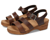 Brown sandals with multiple straps and a buckle on a white background