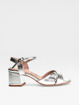 Silver sandal with block heel on a white background