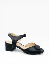 Strada women's black leather sandal with adjustable ankle strap and block heel. Comfortable cushioned insole.