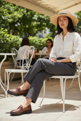 Strada brown leather loafer with moccasin top and lug sole. Classic penny loafer style with cushioned footbed.