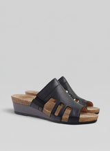 Strada Naot Carriage black leather wedge slide sandals with side cutouts and supportive cork latex footbed.