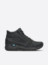 Black basketball shoe with gold accents on a white background