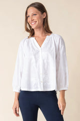 White Habitat Romance Shirt, casual apparel with a relaxed fit, shown on a hanger against a plain background.