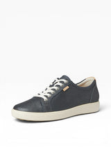 Silver casual shoe with white laces on a white background