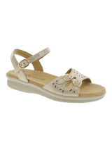 Beige sandal with a strap on a white background