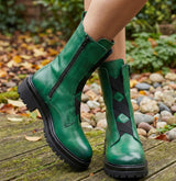 Green leather Eric Michael Quest women's boot with a sleek design and sturdy heel, perfect for stylish casual or dress wear.