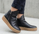 Black Eric Michael Zelda women's boots with a sleek leather design and stylish ankle-high silhouette.