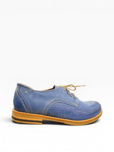 Blue shoe with brown sole on a white background