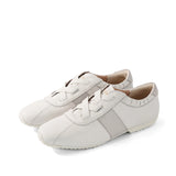 Bussola Posies Slip On Sneakerina in creamy soft cotton with white athletic leisure design and casual slip-on style.