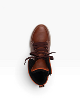 Brown leather boot with laces on a white background