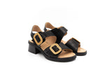 Black Casta Unika women's sandal with open toe and ankle strap, featuring a sleek and stylish design for casual or dressy occasions.