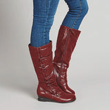 Miz Mooz Bobbie wedge boot for women in ruby leather, featuring a stylish rounded toe and chunky wedge heel.