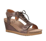 Brown wedge sandal with lace-up design on a white background