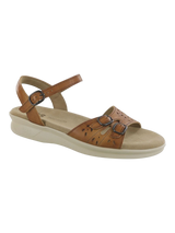 Tan sandal with a strap on a white background