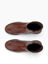 Pair of brown ankle high waterproof boots