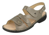 Finn Comfort Gomera women's sandal in fango color with adjustable straps and cushioned footbed, shown from side view.