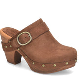 A brown suede clog shoe with a chunky wooden block heel, silver metal studs, and a wide strap with a silver buckle, shown on a white background.