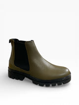Eric Michael Bethany lug sole Chelsea boot showing black leather upper, elastic side panels, and rugged outsole.
