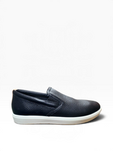Black leather loafers on a white background