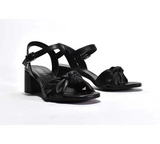 Black Cordani Isadora dress sandal for women with stylish strap design and low heel, ideal for elegant occasions.