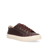 Brown leather sneaker with white sole on a white background