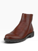 Single brown ankle high waterproof boot